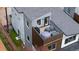 Modern home with a rooftop terrace, perfect for outdoor entertaining and grilling at 4035 Fenton Ct, Wheat Ridge, CO 80212