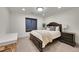 Comfortable bedroom with a large bed, soft lighting, and a nightstand at 4035 Fenton Ct, Wheat Ridge, CO 80212