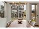 Dining room with large window offers great views of the neighboring modern architecture at 4035 Fenton Ct, Wheat Ridge, CO 80212
