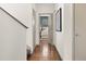 Hallway view leading into a bedroom with hardwood floors at 4035 Fenton Ct, Wheat Ridge, CO 80212