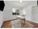 Bright home office featuring a modern desk, stylish chair, and built-in shelving at 4035 Fenton Ct, Wheat Ridge, CO 80212