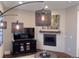 Living room featuring cozy lighting, a fireplace, and modern decor at 4035 Fenton Ct, Wheat Ridge, CO 80212