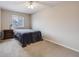 Neutral bedroom with ceiling fan and window at 4821 N Silverlace Dr, Castle Rock, CO 80109