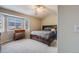 Bedroom with a large window and vaulted ceiling at 4821 N Silverlace Dr, Castle Rock, CO 80109