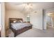 Bedroom featuring a king-size bed, vaulted ceiling, and plenty of space at 4821 N Silverlace Dr, Castle Rock, CO 80109
