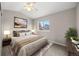 Bedroom featuring a queen size bed and matching decor at 4821 N Silverlace Dr, Castle Rock, CO 80109