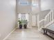Open-concept entryway with high ceilings, ample natural light, and stylish flooring, creating a welcoming atmosphere at 4821 N Silverlace Dr, Castle Rock, CO 80109