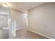 Neutral hallway leads to bedrooms and living areas at 4821 N Silverlace Dr, Castle Rock, CO 80109