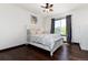 This bedroom features a ceiling fan, ample natural light, and a bed at 3791 Charterwood Cir, Highlands Ranch, CO 80126