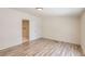 Spacious bedroom with light-colored wood flooring and a closet for storage at 311 Harrison Ave, Fort Lupton, CO 80621