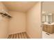 Walk-in closet featuring wire shelving and vinyl flooring, perfect for organization at 311 Harrison Ave, Fort Lupton, CO 80621