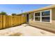 Cozy home featuring a fenced yard, offering privacy and a welcoming entrance at 311 Harrison Ave, Fort Lupton, CO 80621
