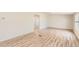 Bright living room with new floors, offering a versatile and inviting space at 311 Harrison Ave, Fort Lupton, CO 80621