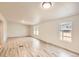 Spacious and airy living room with sleek floors and ample natural light from the windows at 311 Harrison Ave, Fort Lupton, CO 80621