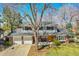 Charming two-story home with brick accents, well-manicured lawn, and a two car garage in a quiet neighborhood at 12423 W 68Th Ave, Arvada, CO 80004