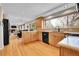 Bright kitchen featuring wooden cabinets, a window above the sink, and modern appliances at 12423 W 68Th Ave, Arvada, CO 80004