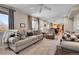 Bright living room showcasing neutral décor, plush seating, and an open layout at 12423 W 68Th Ave, Arvada, CO 80004