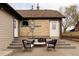 Backyard patio area with outdoor seating and access to the home, perfect for entertaining at 4828 W 32Nd Ave, Denver, CO 80212