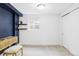 Modern basement area with shelving, natural light, and ample space for activities at 4828 W 32Nd Ave, Denver, CO 80212
