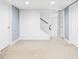 Spacious basement featuring neutral carpet and white trim at 4828 W 32Nd Ave, Denver, CO 80212