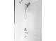 This bathroom features a modern shower with dual shower heads and white tile at 4828 W 32Nd Ave, Denver, CO 80212
