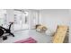 Bonus room features a sliding glass door and lots of natural light at 4828 W 32Nd Ave, Denver, CO 80212