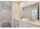 Bright bathroom with double vanity, and a combined shower and tub at 920 Promenade Dr, Superior, CO 80027