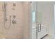 Modern bathroom with large walk-in shower featuring multiple shower heads and double vanity at 920 Promenade Dr, Superior, CO 80027