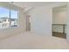 Bright bedroom with a view, carpet flooring and multiple doors at 920 Promenade Dr, Superior, CO 80027