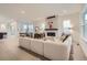 Bright and airy living room featuring a modern fireplace and open layout at 920 Promenade Dr, Superior, CO 80027