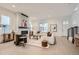 Bright, spacious living room featuring a modern fireplace and an open floor plan at 920 Promenade Dr, Superior, CO 80027
