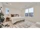 Bright main bedroom with a neutral color scheme, modern rug and large windows at 920 Promenade Dr, Superior, CO 80027