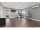 Bright game room with wood floors and plenty of room for activities at 11039 Roxborough Dr, Littleton, CO 80125