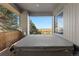 Relaxing outdoor hot tub on private balcony with panoramic views of the surrounding landscape at 11039 Roxborough Dr, Littleton, CO 80125