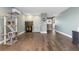 Open-concept living room boasts hardwood floors and plenty of space for entertaining guests at 11039 Roxborough Dr, Littleton, CO 80125