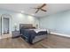 Inviting main bedroom with ample space, a ceiling fan, and ensuite bathroom access at 11039 Roxborough Dr, Littleton, CO 80125