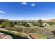 Scenic view of the home and surrounding landscape with rolling hills and blue sky at 11039 Roxborough Dr, Littleton, CO 80125