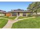 Charming home with a well-maintained front yard, a cozy exterior, and a welcoming pathway at 3827 S Fraser St, Aurora, CO 80014
