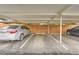 Designated covered parking spots with labeled numbers and well-defined parking lines at 3827 S Fraser St, Aurora, CO 80014