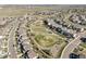 Aerial view of neighborhood featuring green space, walking paths, and residential streets at 13979 Night Owl Ln, Parker, CO 80134