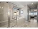 Bathroom features a glass shower, a garden tub and natural light at 13979 Night Owl Ln, Parker, CO 80134