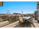 Outdoor deck featuring a table and chairs perfect for relaxing at 13979 Night Owl Ln, Parker, CO 80134