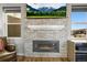 Modern fireplace is the focal point of this lovely living room at 13979 Night Owl Ln, Parker, CO 80134