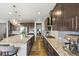 State-of-the-art kitchen with stainless appliances, and a huge granite island at 13979 Night Owl Ln, Parker, CO 80134