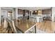 Spacious eat-in kitchen with wooden dining table, kitchen island, and modern appliances at 13979 Night Owl Ln, Parker, CO 80134