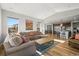 Inviting living room adjacent to a well-equipped kitchen, ideal for gatherings at 13979 Night Owl Ln, Parker, CO 80134