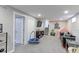 Finished basement with carpet, a TV area, and space for recreation at 2136 S Balsam Ct, Lakewood, CO 80227
