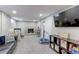 Finished basement with a fireplace, carpet floors, and built-in shelving at 2136 S Balsam Ct, Lakewood, CO 80227