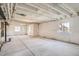 Unfinished basement with sealed walls and visible ceiling pipes, providing potential for customization at 14120 Bunny Hop Ln, Parker, CO 80134
