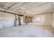 Spacious unfinished basement with exposed pipes, offering a blank canvas for future renovation and personalization at 14120 Bunny Hop Ln, Parker, CO 80134